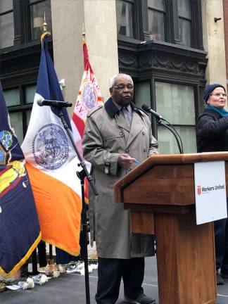 <b>Edgar Romney, an executive vice president at We Unite, and a one time business rep with the International Ladies Garment Workers Union before it merged with the Amalgamated Clothing and Textile Workers Union in 1995 to form the Union of Needletrades, serves as master of ceremony for the Triangle Shirt Waist Factory Remembrance commemoration.</b> Photo: Keith J. Kelly