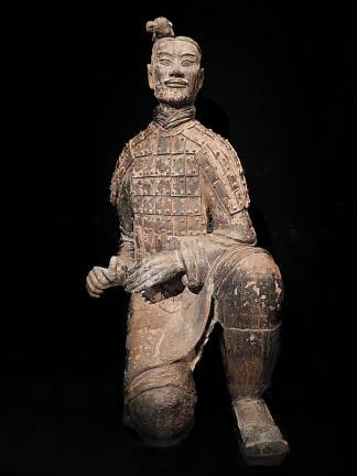 A kneeling archer from China's famed Terracotta Army still bears traces of the bright pigments that once decorated his armor. Photo: Adel Gorgy