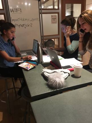 Members of Coalition Z, a political action group founded by three students from The Dalton School, placed calls to their representatives to voice their opposition to cabinet appointments and executive orders that have defined the first weeks of President Donald Trump's tenure. Photo: Zoe Davidson  