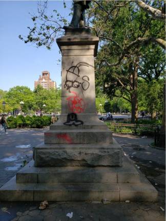 Graffiti on statue of Garibaldi in Washington Square Park. Photo: Erika Sumner