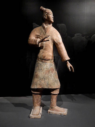 This standing terracotta figure, portraying an actual soldier from 2200 years ago, is one of thousands found in Emperor Shi Huang's burial pit. Photo: Adel Gorgy