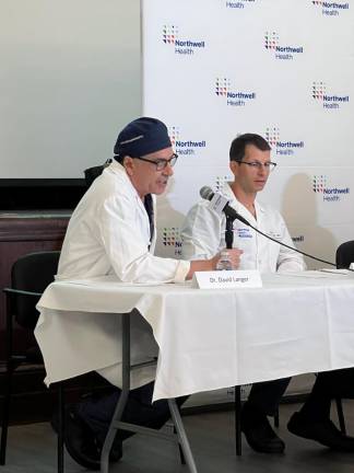 Dr. David Langer and Dr. John Cardi of Lenox Hill Hospital. Langer is the chair of neurosurgery department at the hospital, while Cardi oversaw Kylie Ossege’s most recent spinal surgery.