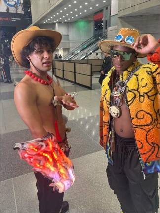 Two friends dressed up as Ace from “One Piece.”