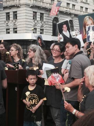 Hsi-Pei Liao holds a picture of his daughter, Allison, who was killed in 2013.He was among hundreds of others who attended the Vigil for Vision Zero at Union Square Tuesday evening. Photo: Logan Hendrix
