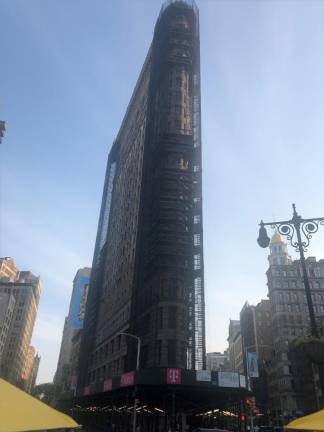 <b>The Flatiron Building, which has been empty since 2019, is sheathed in scaffolding today. It was just sold for $161 million.</b> Photo: Keith J. Kelly