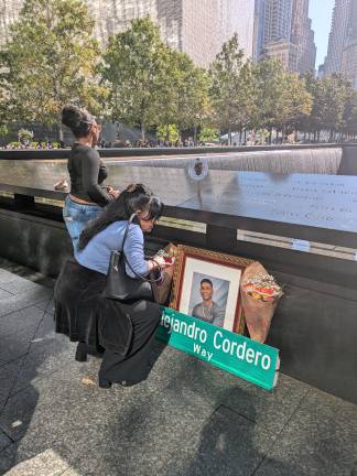 Family of 9/11 victim Alejandro Cordero, 23, an accountant at Marsh McLennan, Sep. 11, 2025.