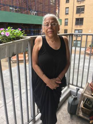 Sharon Canns, pictured on her balcony last fall after she was charged for repairs she says were never finished.&#xa0;She and several other tenant advocates attribute many rent-stabilized housing issues to lack of oversight by the DHCR. Photo: Madeleine Thompson