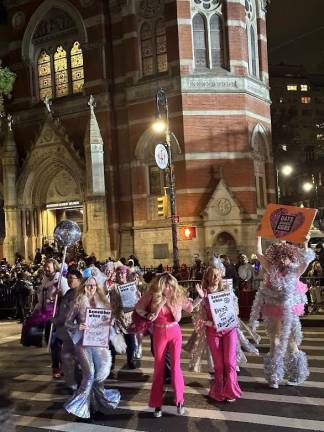 Group of people dressed to the theme of “Barbie” advocate for gay right’s.