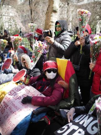 The strike ended with a celebratory rally, during which supporters gifted flower bouquets to the strikers.