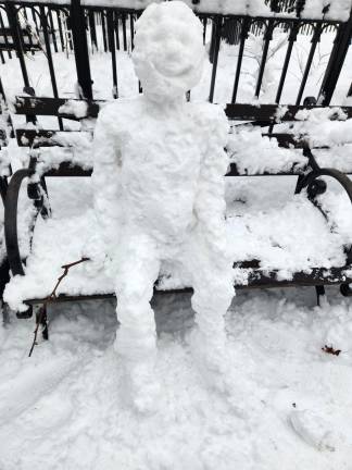 A seated snowman outside Madison Square Park on Feb. 23. Maybe he was waiting for the park to reopen.