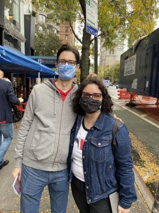 Jason Ginsburg and Wendy Felton waited four hours to cast their ballots on Broadway and 63rd Street. Photo: Alexis Gelber