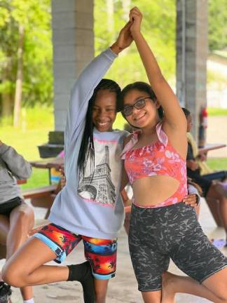 Yoga duo at Camp Felix. Photo: Natalie Mines