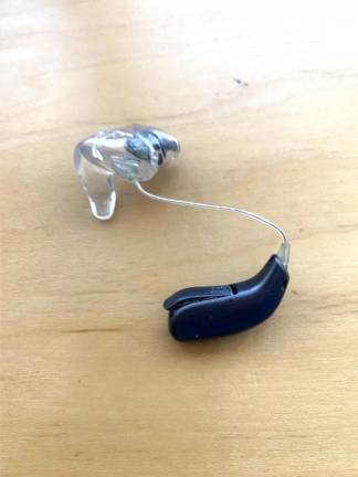 Hearing aids are used by only one in five people who would benefit. Photo: Jonathan Taylor