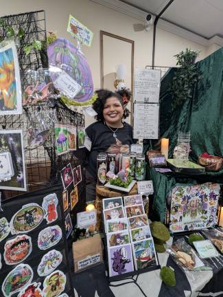 Kira Marie Britt is pictured here at one of her artist markets.