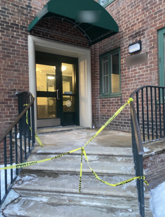 A crime scene on Jan. 29 (above). The suspect was said to have first trailed a woman into an elevator in a different building in Stuyvesant Town but left when he encountered another person in the elevator. He then walked across a sidewalk to the above building where he attacked a 14-year-old girl, the DA charged.