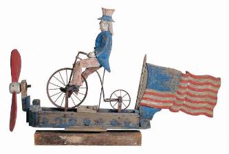 Uncle Sam Riding a Bicycle Whirligig, Probably New York State, 1880–1920, Paint on wood with metal, 37 x 55 1/2 x 11 in., Gift of Dorothea and Leo Rabkin.