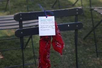 On one chair, a red bandana and note commemorated the life of Welles Crowther, a stock trader and volunteer firefighter who saved as many as 18 lives before he died in the South Tower.