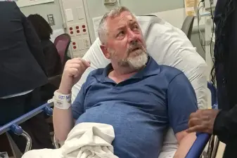 Hate crime victim Rami Glickstein in the hospital after being attacked on Oct. 27, 2025.