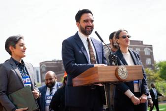 Mayor Mamdani (at mic) produced a set of reforms aimed at cutting red tape for affordable housing development.