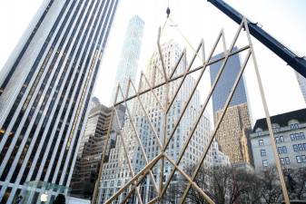 The world’s largest Hanukkah menorah is raised by a crane in New York City on Wednesday, December 18, 2019. Photo: Itzik Roytman / Chabad.org via Flickr