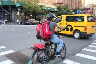 Delivery biker near East 77th Street. Photo: Gaby Messino