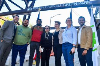 CB8 District Manager Will Brightbill, Manhattan Parks Commissioner Anthony Perez, CB6 Chair Kyle Athayde, CB8 Parks Committee Co-Chair Judy Schneider, Council Member Julie Menin, Economic Development Corp. Senior VP Kathryn Prybylski and Roosevelt Island Operation Corp. Planning Director Prince Shah in front of the new sign for Andrew Haswell Green Park. Photo: NYC Parks/Daniel Avila