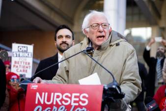 Senator Bernie Sanders (at mic) and Mayor Zohran Mamdani address nurses in bitter cold outside Mount Sinai West hospital on Tenth Ave. and W. 59th St. on Jan. 20 during the ninth day of the strike.