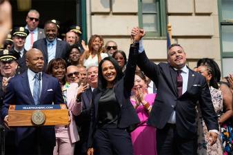 Edward Caban and Tania Kinsella pictured during a press conference at NYPD’s 40th Precinct in the Bronx, where they were announced as the new commissioner and deputy commissioner of the force, respectively. Mayor Eric Adams noted that Caban would be the first Latino commissioner in NYPD history, with Kinsella being the first woman of color to serve as second-in-command.
