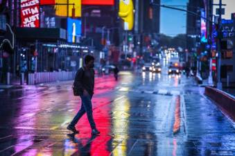 A rainy and empty Times Square on Monday, May 11, 2020.