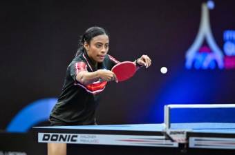 Yasiris Ortiz, four time world champion table tennis player who coaches at a Ping Pod on the UES is also heading up Spin &amp; Learn in city public schools. From one school, it now boasts 10,000 students in 30 public schools across the city.
