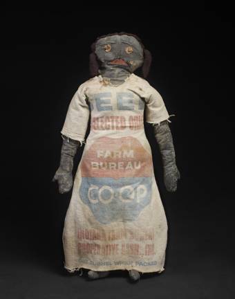 Doll in feed sack dress, 1900-25. Possibly Indiana. Mixed fabrics, paint. Deborah Neff Collection. Photo: Ellen McDermott Photography