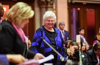 NYS Assembly Member Rebecca Seawright in the Assembly Chamber presenting a proclamation to Sarah Weddington in 2019. Photo: Haley Hershenson