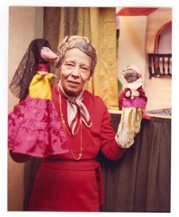 Pura Belpré with puppets.