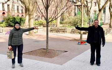 The author (right) practices social distancing in Clement Moore Park with Barbara from London Terrace.