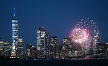 Governor Andrew M. Cuomo announced that landmarks across the state would be lit blue and gold on June 15 in celebration of 70 percent of New York adults receiving their first dose of COVID-19 vaccine. Here, fireworks in New York Harbor. Photo: Kevin P. Coughlin / Office of Governor Andrew M. Cuomo