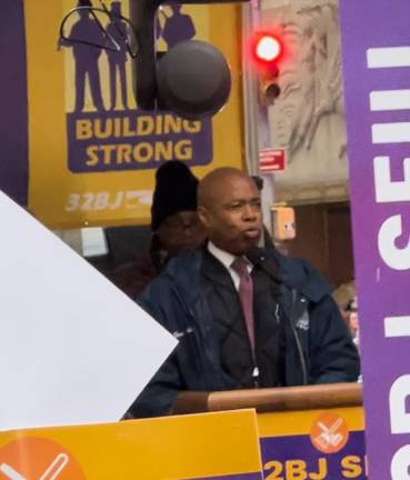 Mayor Eric Adams speaking at a 32BJ SEIU strike authorization rally on December 20.