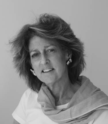 Ellen Warner is a photojournalist whose specialty is author portraits and a writer of travel articles. “The Other Half” is her second book. She lives in New York.