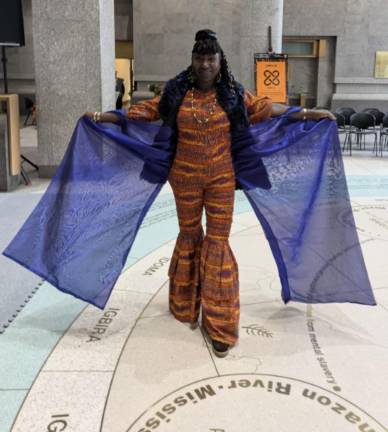 Stunningly dressed woman at Kwanzaa, African Burial Ground National Monument, Dec. 26, 2025.