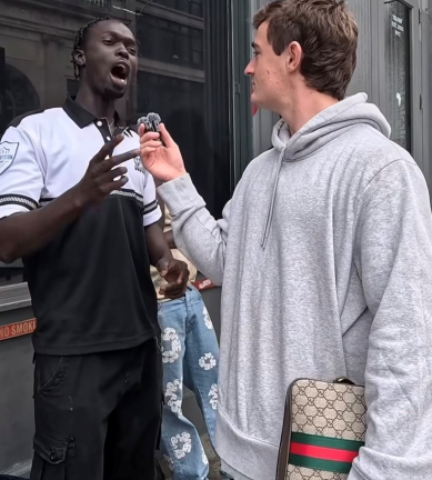A man believed to be a West African migrant being interviewed by Nick Shirley, a conservative podcaster.