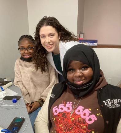 MedAchieve students with Touro student mentor at graduation. Photo: Barbara Franklin