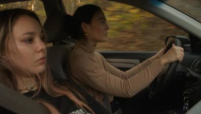Nic (left, played by Claire Dunn) is driving cross country with her older sister Charlie (Samantha Ahn) who tries to conceal her sex addiction in a film written and directed by Alexandra Qin. It is competing in the best short film category at the Sundance Film Festival later this month. Photo: Courtesy of Alexandra Qin/”Thirstygirl “