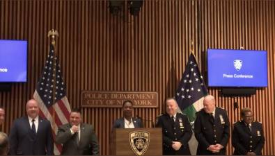 NYPD Commissioner Kechant Sewell (at mic) at press conference after arrest of Manhattan slasher. Photo via NYPD News on Twitter