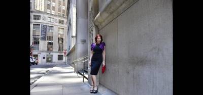 Karen Rempel waits for her cocktail date at 20 Exchange Place.