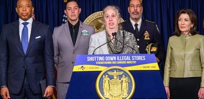 UWS City Council member Gale Brewer (at mic) was invited by Governor Kathy Hochul (far right) to join NYC Mayor Eric Adams (left) and NYC Sheriff Anthony Miranda (rear) and other officials announcing new law designed to curb illegal weed shops. Photo: Office of City Council member Gale Brewer