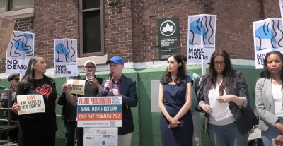 Andrew Berman, head of Village Preservation, leads a June 1 rally outside the historic Tony Dapolito Recreation Center. Rallygoers hoped to convince city officials to reroute $51 million in proposed demolition-and-rebuild funds towards repairs, instead.