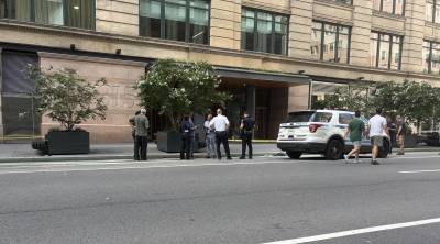 First responders outside 315 Hudson Street office building at 3:40 p.m.on Aug. 28 where a 63-year-old man earlier set himself on fire.
