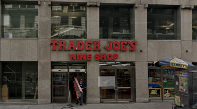 Trader’s Joe Wine Shop on E. 14th St. in 2021. The store closed in 2022. Now, the National Labor Relations Board has alleged that the shut-down was an act of labor retaliation.
