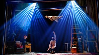 Jamie Allan, while trained in old-school magician tricks, uses lasers, light shows, and hi-tech in his magic acts.