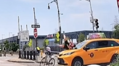 A taxi struck a biker on the West Side Highway on July 26, dramatic footage on the social media Next Door shows.