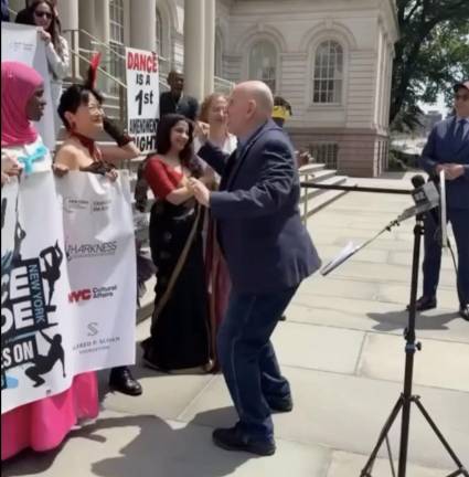 Council Member Harvey Epstein shakes it at pre-NYC Dance Parade rally at City Hall.